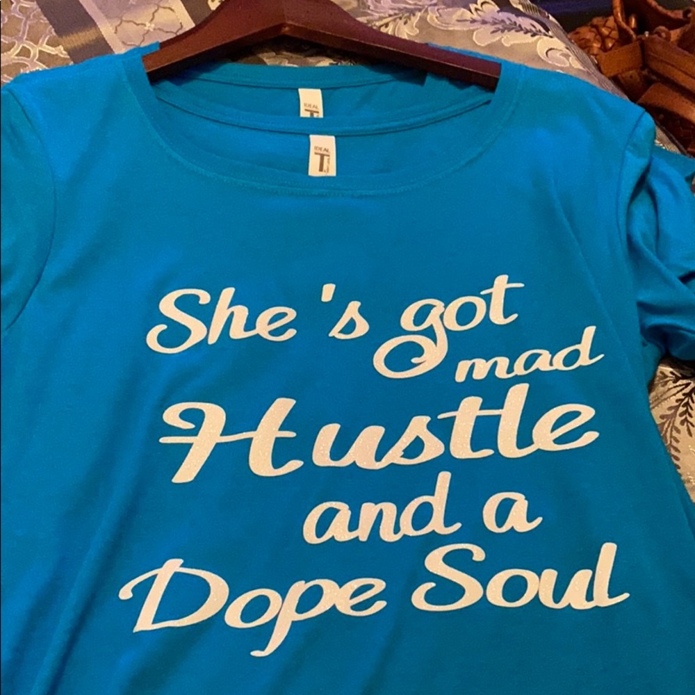 She’s got mad Hustle and a Dope Soul Tee